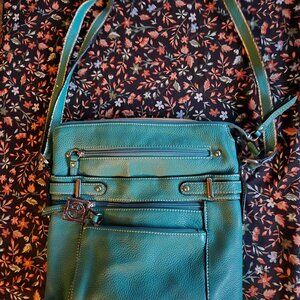 Giani Bernini purse, super functional with an excess of pockets.